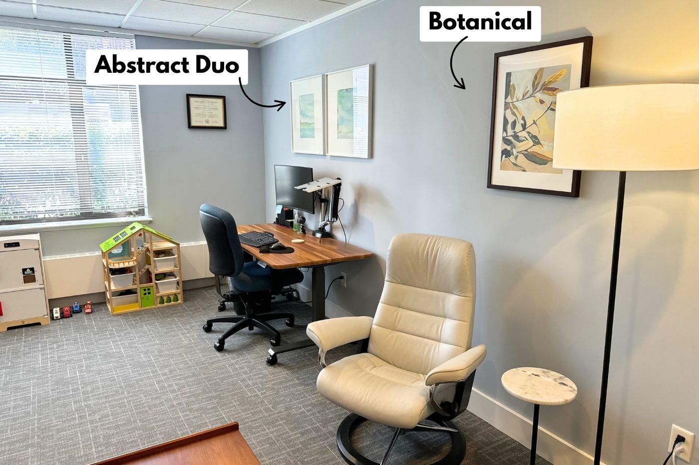 Office wall art showing combination of botanic art and abstract duo, each labeled on the therapy office photo
